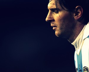 Messi of Argentina looks down as he walks during a friendly soccer match against Albania in Buenos Aires