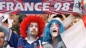 French supporters wave a France 98 scarf in celebration during the group C soccer World Cup 98 match between France and Saudi Arabia at the Stade de France in St Denis, north of Paris Thursday June 18, 1998. (Michel Lipchitz/AP)
